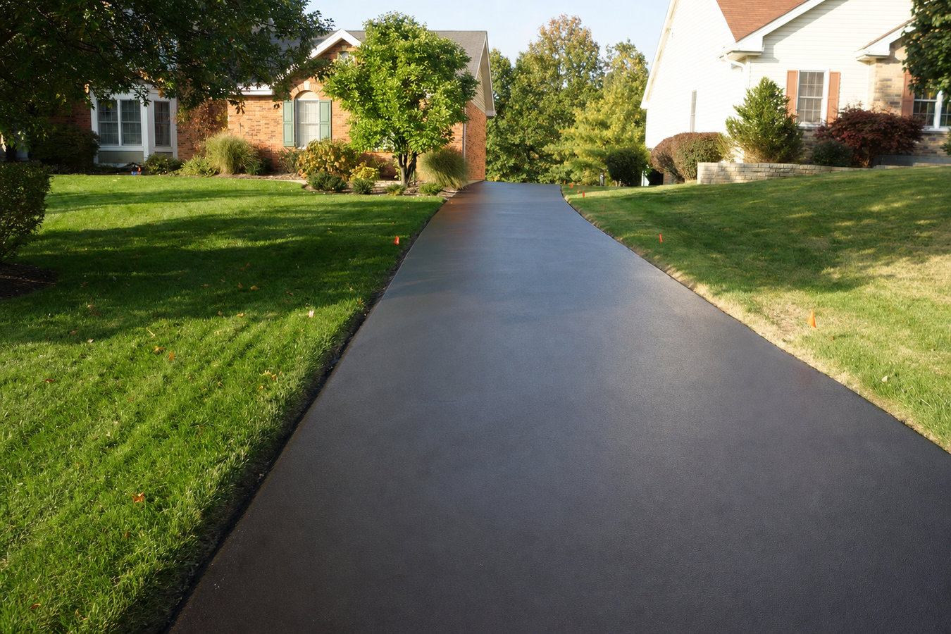 Asphalt sealcoating